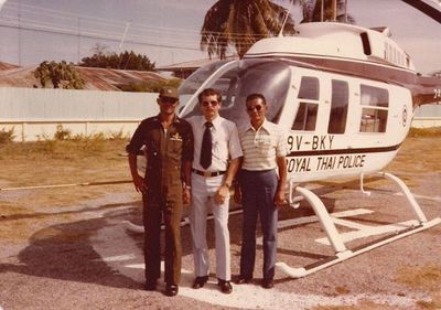 Bill Perkins with royal thai border police and Bell 206L helicopter in Thailand Resized - Copy - Copy - Copy - Copy.jpg